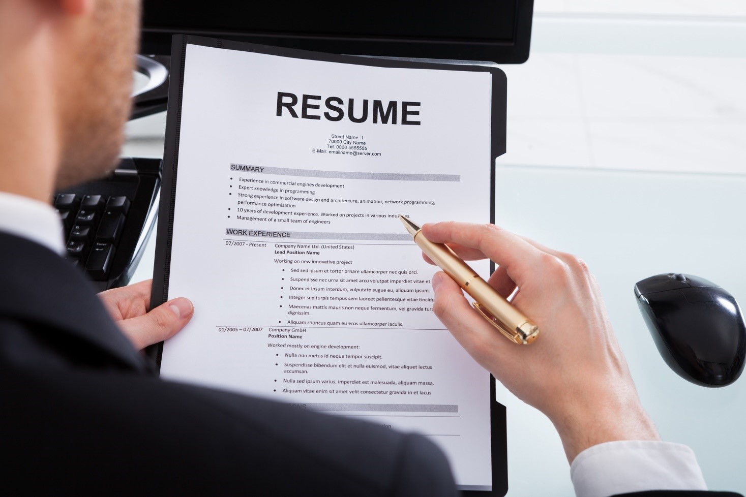 Job seeker reviewing open positions online